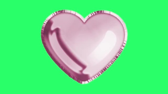 动画粉红色气球心形隔离漂浮在绿色背景上。