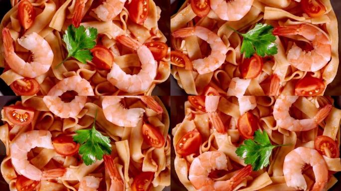 意大利面宽面条配番茄酱、虾和西红柿放在灰色盘子上，旋转、转动、特写微距、顶视图