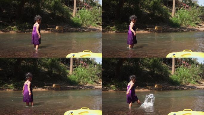 小东南亚女孩在河里玩耍