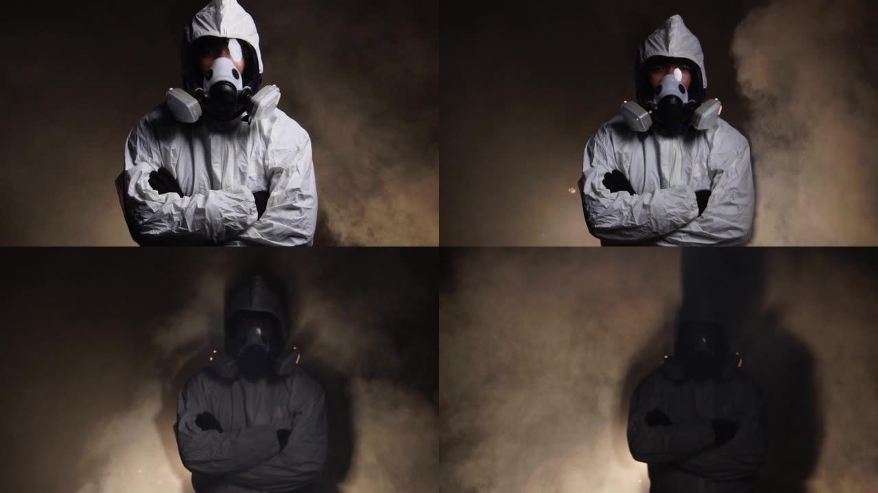 穿着防护服和防毒面具的男子站在雾中