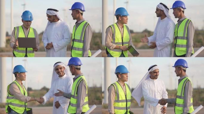 亚洲工程师和阿拉伯商人检查和检查日落天空的建筑。人操作。清洁能源和环境电气用风力涡轮机。可持续工业。