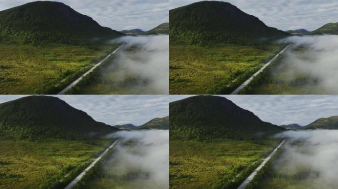 穿越挪威高地的道路上汽车的风景鸟瞰图