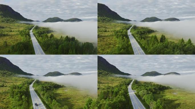 Scenic aerial view of car on the road through Norw