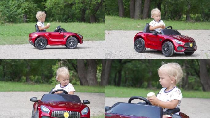 快乐的孩子吃冰淇淋在夏季公园驾驶电动玩具车。1.5岁的小孩玩得开心骑电池动力汽车。小男孩骑着小汽车玩