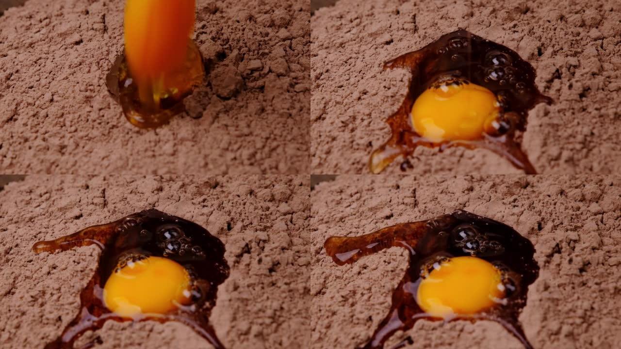 鸡蛋以慢动作落入可可粉特写。制作自制巧克力饼干或布朗尼蛋糕的分步食谱。