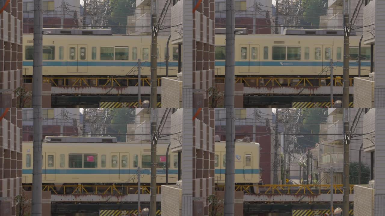 日本火车穿越小巷的远摄照片