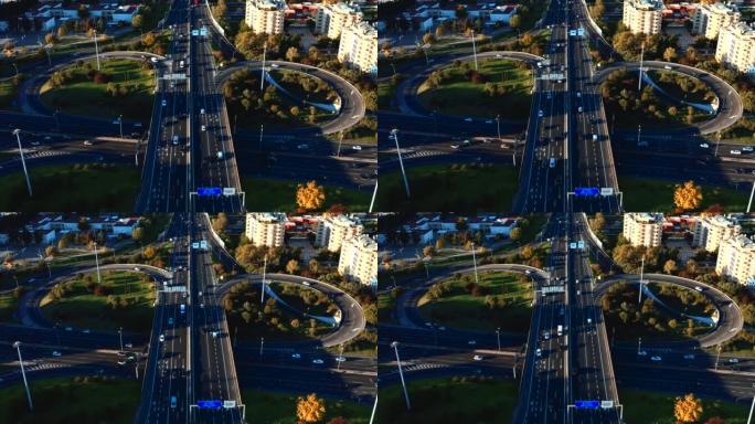 里斯本的一条快车道的航拍图像以慢动作的方式横穿城市
