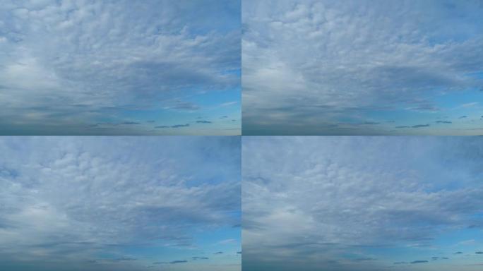 蓬松的分层云天空大气。蓬松蓬松的白云。形成云天空景观。延时。
