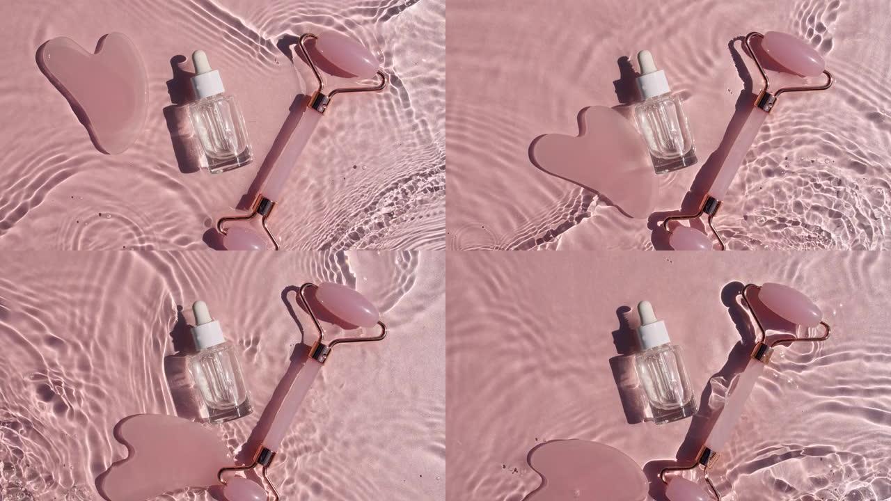 化妆品瓶与移液管在粉红色背景与水滴。反射阳光和阴影的纯净水。波浪水的慢动作。保湿护肤品的广告。