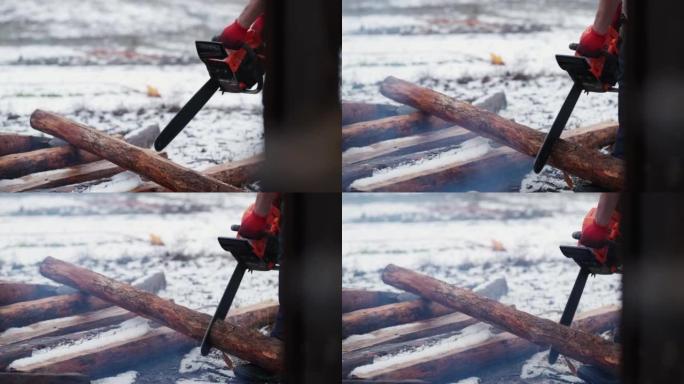 木工工具人使用电锯切割原木