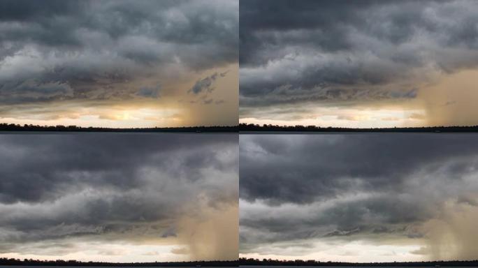 黑暗戏剧性的暴风雨天空的时间流逝，带有某些阳光区域的快速移动的乌云