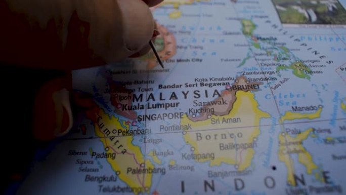 马来西亚在政治地图上的位置旅游概念宏观特写查看股票视频