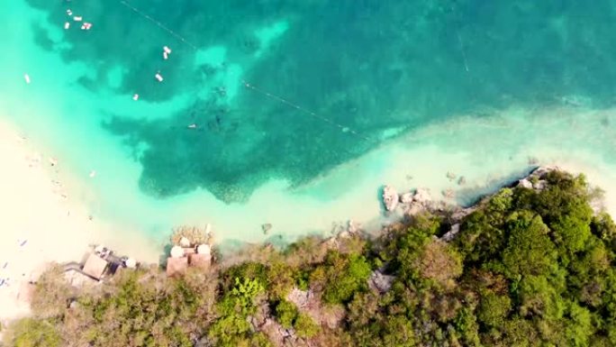 无人机在海地皇家加勒比私人岛屿labadee的岛屿海滩上拍摄