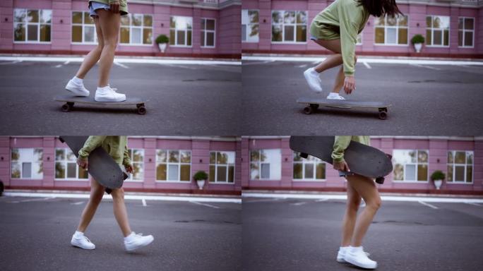女孩从滑板上下来，捡起它，继续移动。青少年娱乐、车辆、爱好