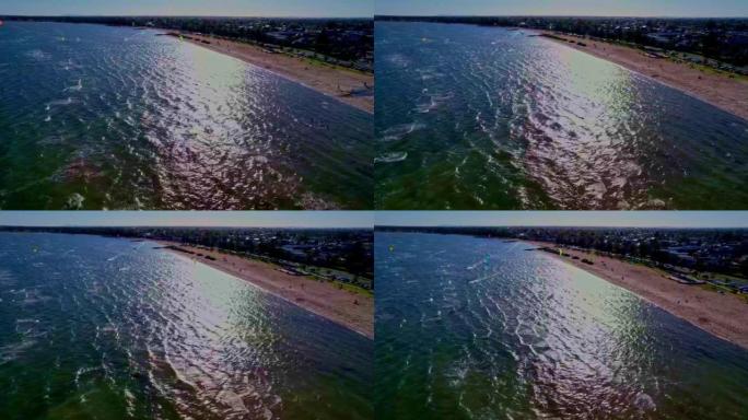 风平浪静的海浪接近沙滩的空中无人机镜头