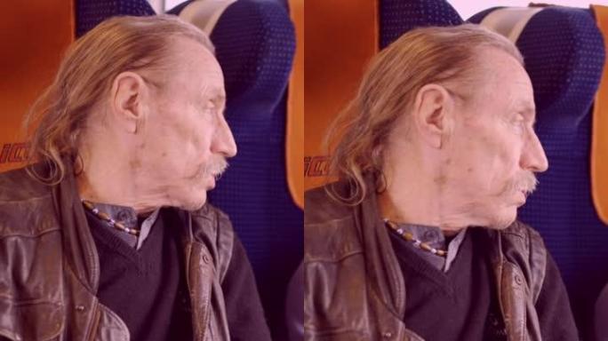 垂直视频-戴眼镜的老人在火车上旅行并与他的良心交谈