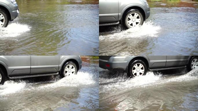 一场雨后城市里的洪水。汽车沿着街道行驶。慢动作。