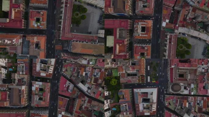 自上而下平移穿过市中心街道的车辆的镜头。但丁广场周围的建筑。意大利那不勒斯