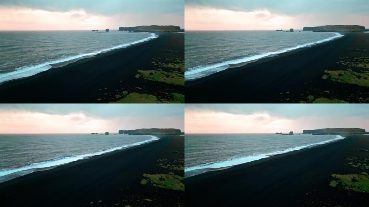 冰岛Reynisfjara海滩日落时的大风天气和海浪