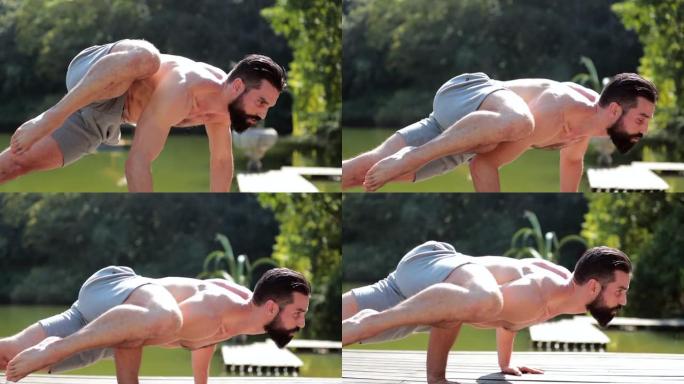 帅气运动员训练瑜伽屈伸手臂做力量运动