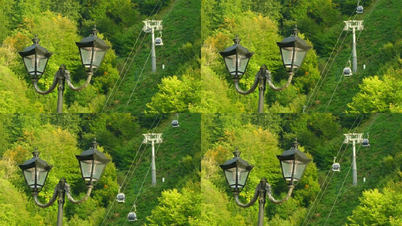 缆车背景上的路灯上下山索道