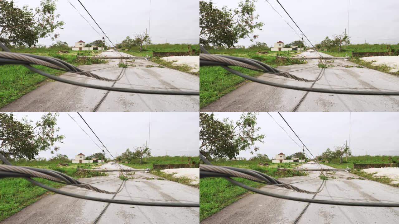 热带飓风过后掉落的电源线电缆。自然灾害的后果