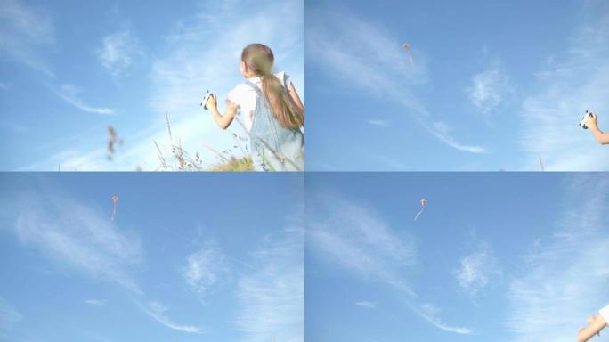 4k小女孩在明亮的蓝色天空中发起放风筝，拉着长绳。童年，户外消磨时间，休闲活动，游戏概念。