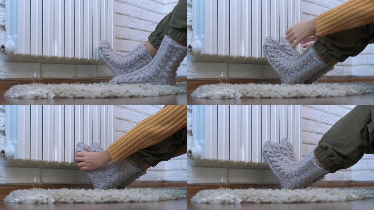 用家用取暖器穿袜子。
