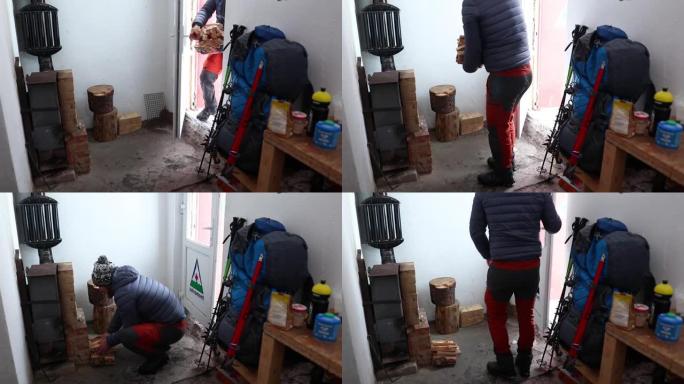 成年男性在罗马尼亚的高山救援舱中携带柴火，以高清拍摄