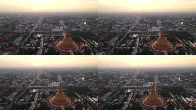 泰国佛统城大塔的空中无人机日落场景