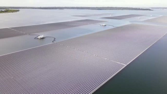 鸟瞰图浮动太阳能电池发电厂用太阳能电池在湖上发电