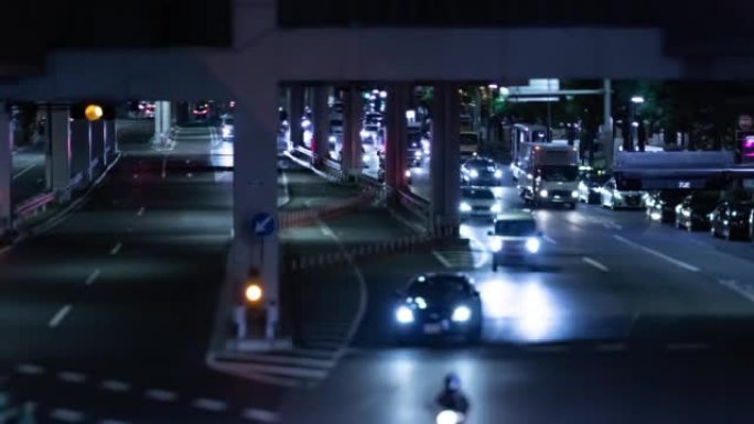 东京城市街道上微型交通拥堵的夜晚时光倒流