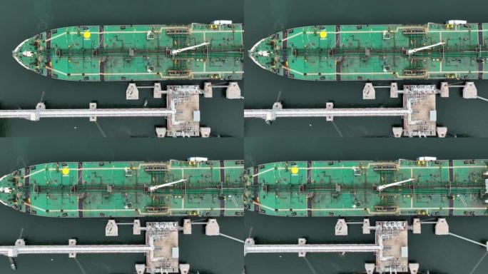 石油原油油轮船，货物集装箱船海上系泊在大洋湾石油化工出口进口运输和物流