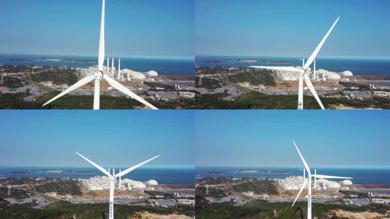 风力发电机组和火力发电站，新能源与传统能源形成鲜明对比