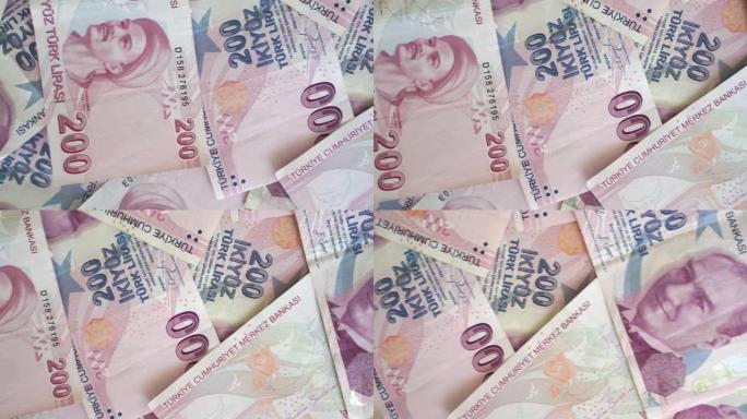 商业，金融，储蓄，银行和人的概念-200尝试200土耳其里拉钞票的货币捆绑。土耳其纸币。土耳其货币经