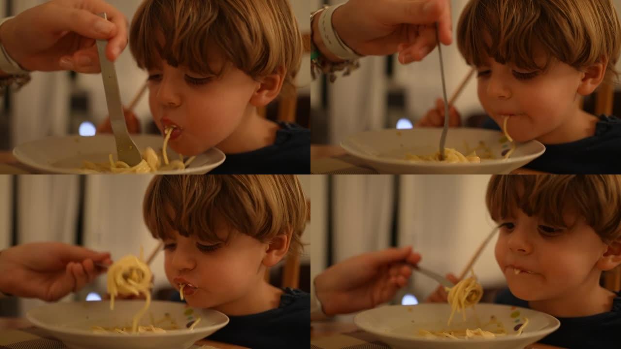 孩子把食物吐到盘子里。小男孩不想吃饭