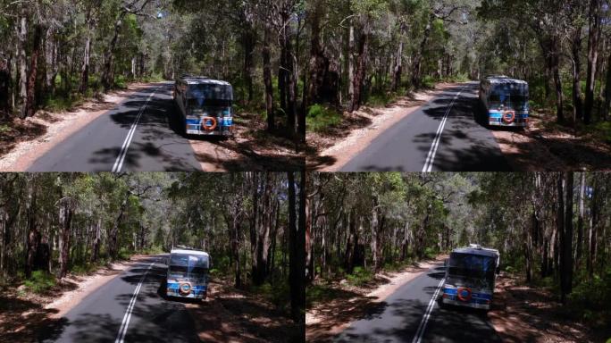 在西澳大利亚州的乡间小路上行驶的野营巴士的4k镜头
