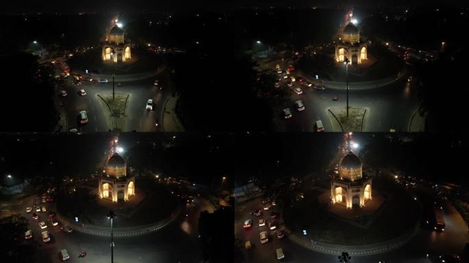 空中无人机拍摄的回旋Sabz Burj在印度新德里晚上，德里道路德里交通交叉口莫卧儿圆顶建筑墓