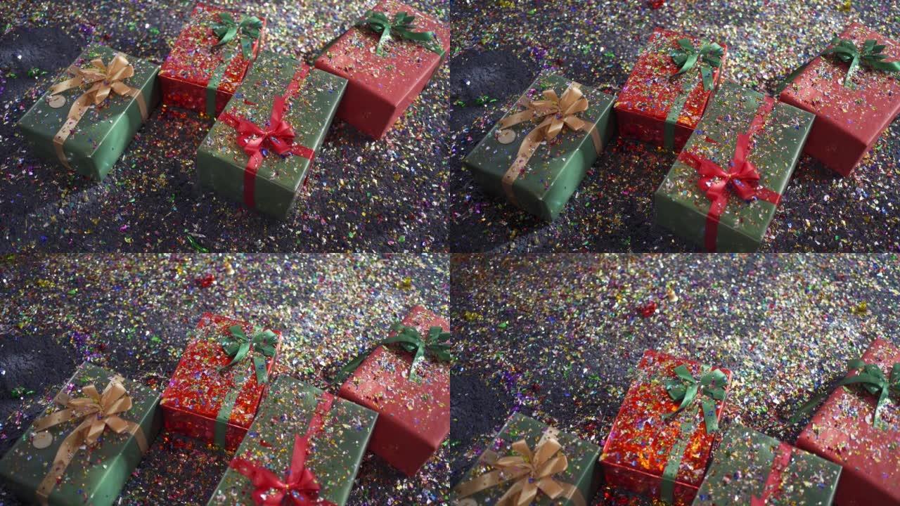 礼品礼盒，地板地毯上有彩色五彩纸屑派对波普尔图案纹理背景。庆祝活动