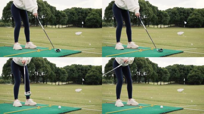 女子初学者练习高尔夫，成功击球，4k慢动作镜头。