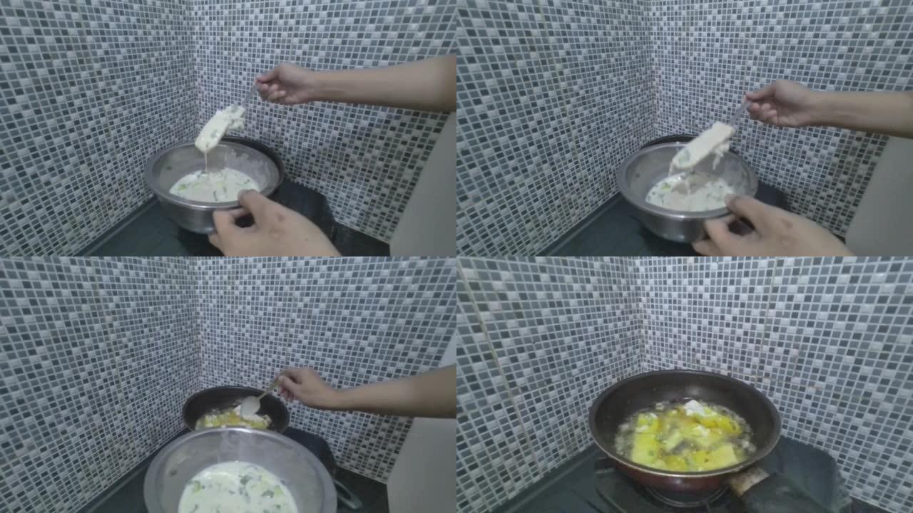 烹饪面粉涂层油炸豆豉。一种由发酵大豆制成的印尼传统食品。