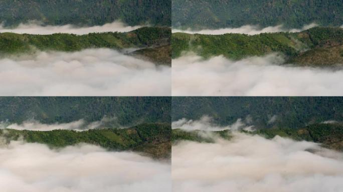 泰国亚拉省艾耶翁古农西里帕特视点的美丽日出与雾在山上滚动的延时