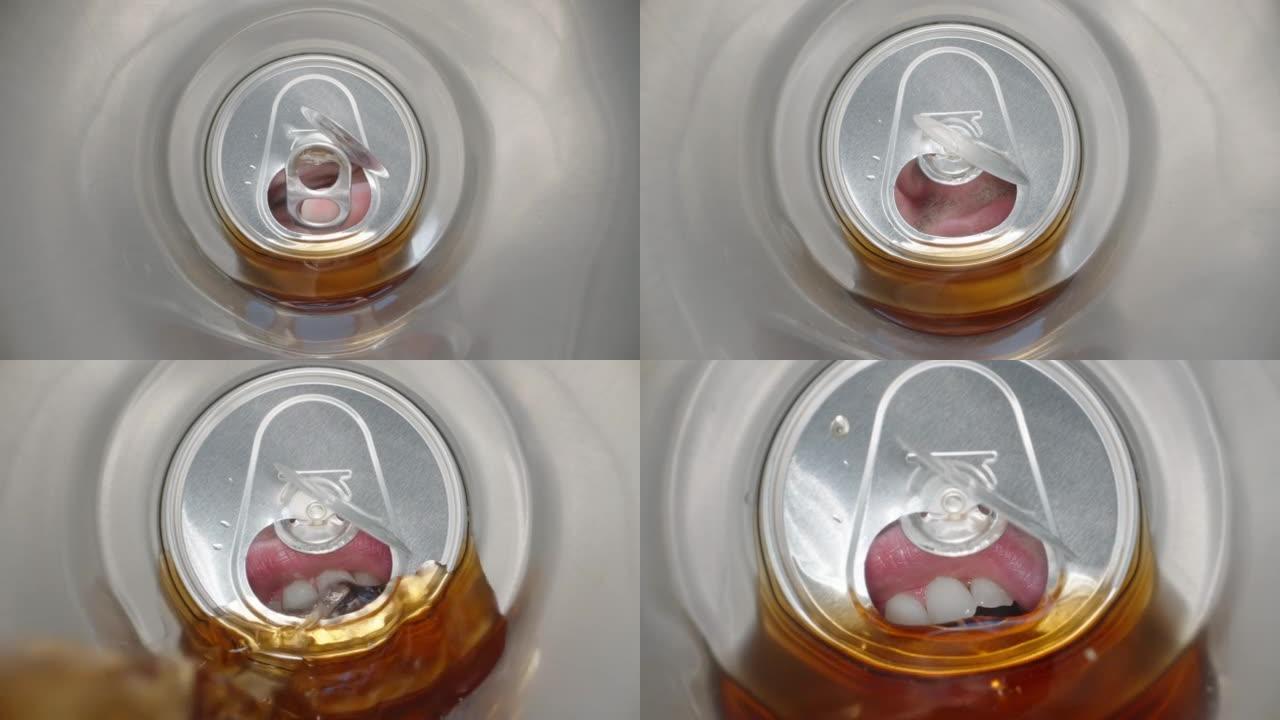 在一个金属罐可乐中，一个男人打开并喝了一个超级特写镜头。多莉滑块