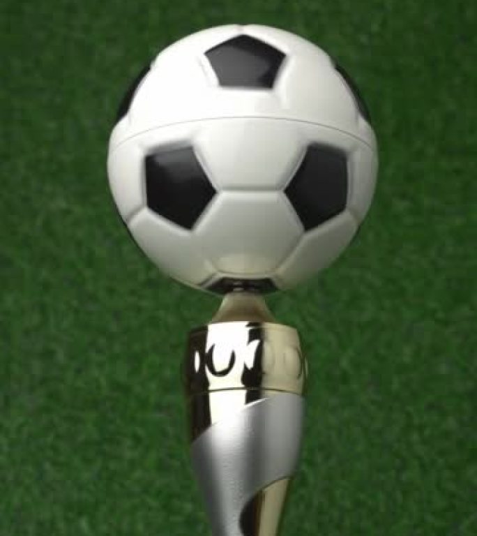 足球冠军奖杯随着金色的五彩纸屑而旋转。垂直视频4K