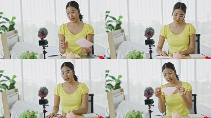 亚洲少女在家展示教学视频通话。