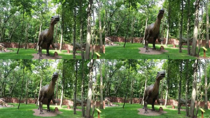 恐龙，parasaurororophus靠近绿色植物的背景