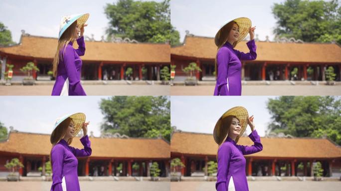 在越南河内城市城镇旅行的当地寺庙中，亚洲越南女女孩的肖像。人们的生活方式。
