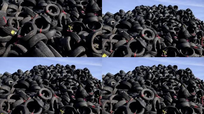 垃圾填埋场堆放的旧轮胎和损坏的轮胎的B卷，准备回收