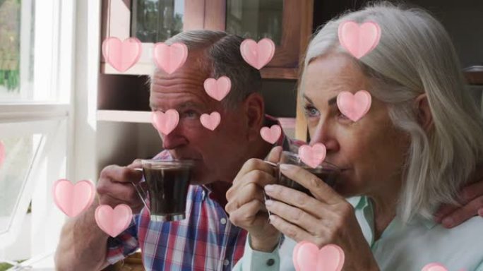 高级夫妇喝咖啡的心脏图标动画