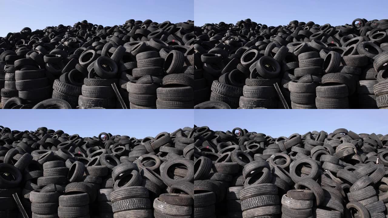 垃圾填埋场堆放的旧轮胎和损坏的轮胎的B卷，准备回收